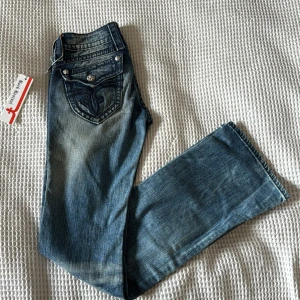 Rock revival jeans w26 - Rock revival jeans i waist 26. Bootcut och lågmidjade. Har ej bilder på då dem är för små