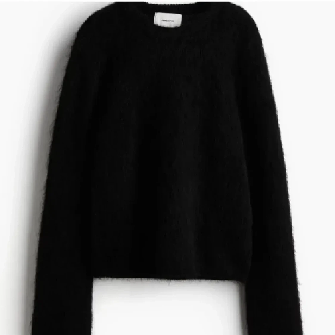 Svart stickad tröja från hm