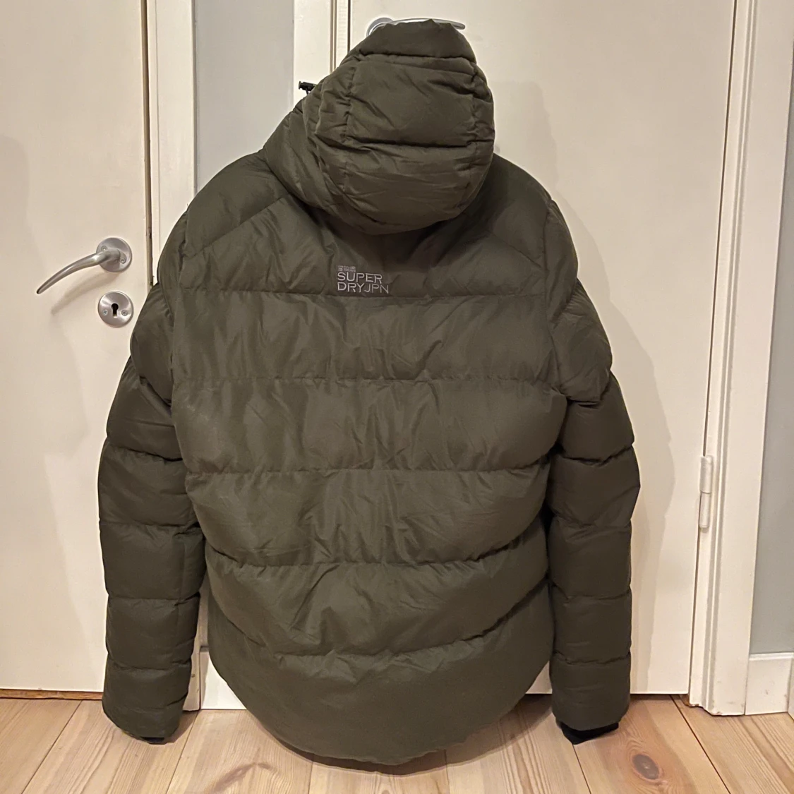 Grön pufferjacka från Superdry - 90