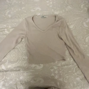 Topp - Den e för liten på mig. Men är i super sick