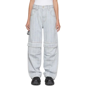 Eytys Titan 32/34 - Säljer mina Eytys Titan, storlek 32/34. Fickor på knäna och snöre i midjan för att justera fit. Byxorna har ett randigt mönster i blått och vitt.