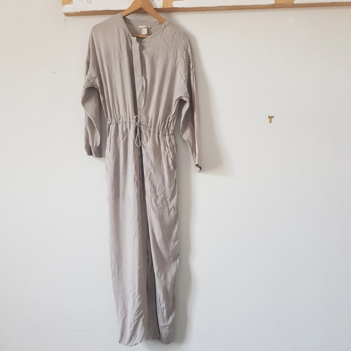 Beige lång jumpsuit