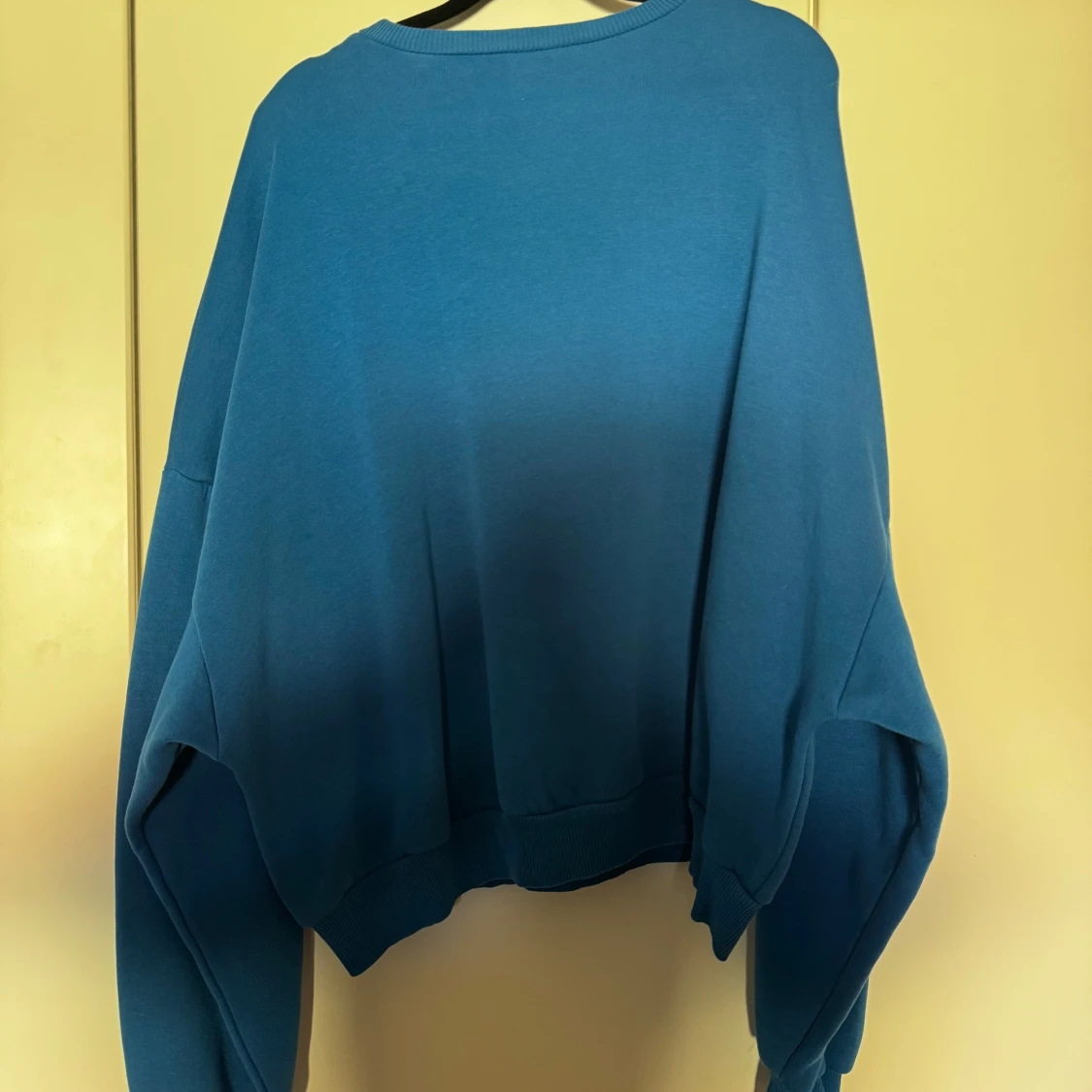 Blå oversize collegetröja - 90