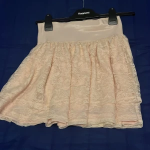 Ljus Rosa kjol - Storlek:34
