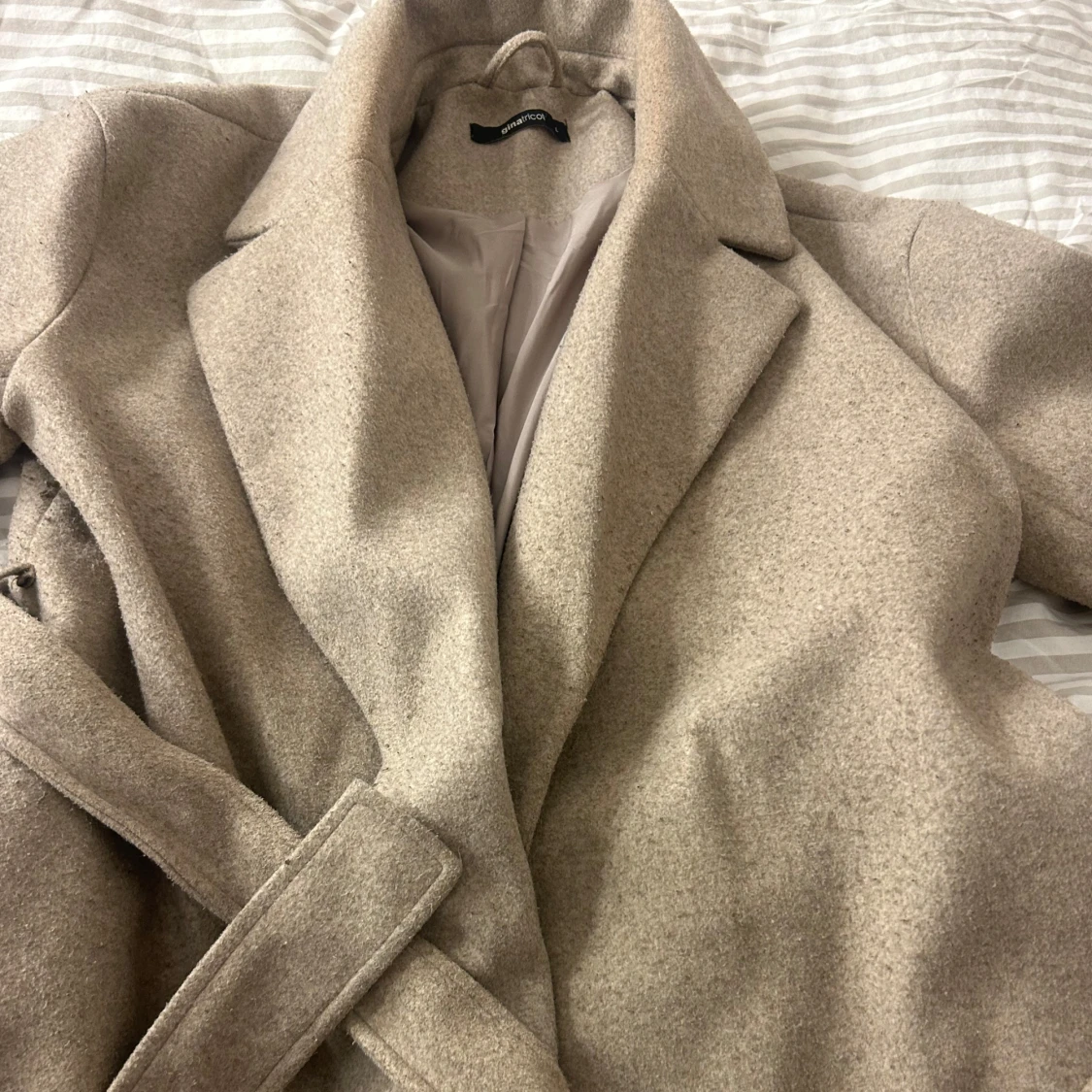 Beige kappa från Gina Tricot - 91