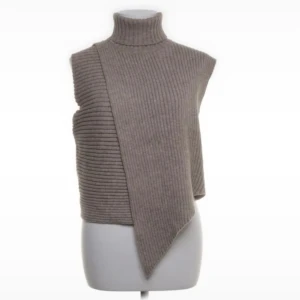 Stickad slipover  - Stickad slipover, aldrig använd 