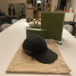 Gucci keps - Nyskick knappast andvänd