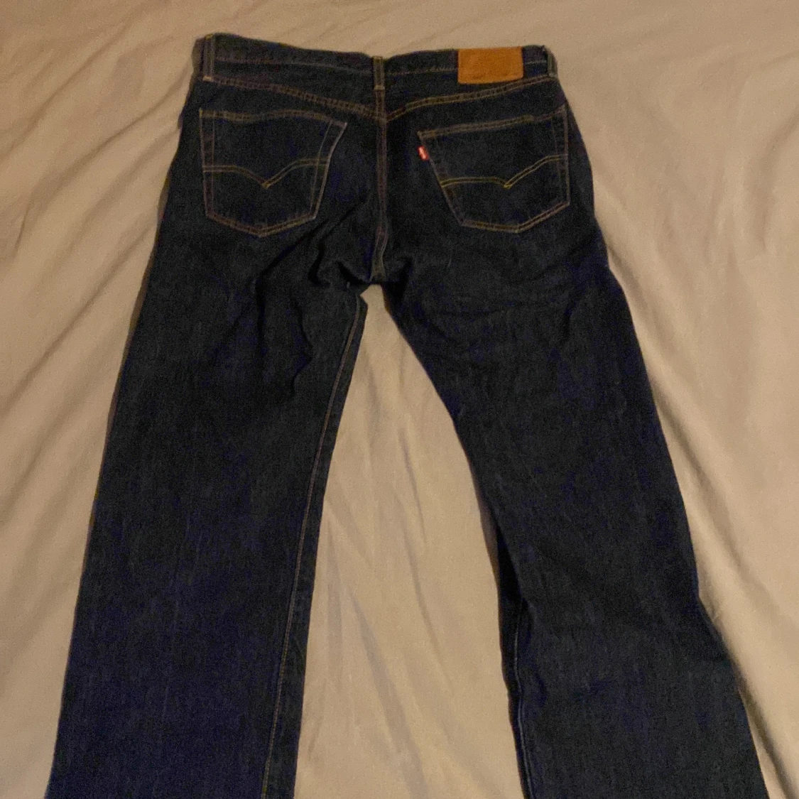 Mörkblå jeans från Levi's W33 L34