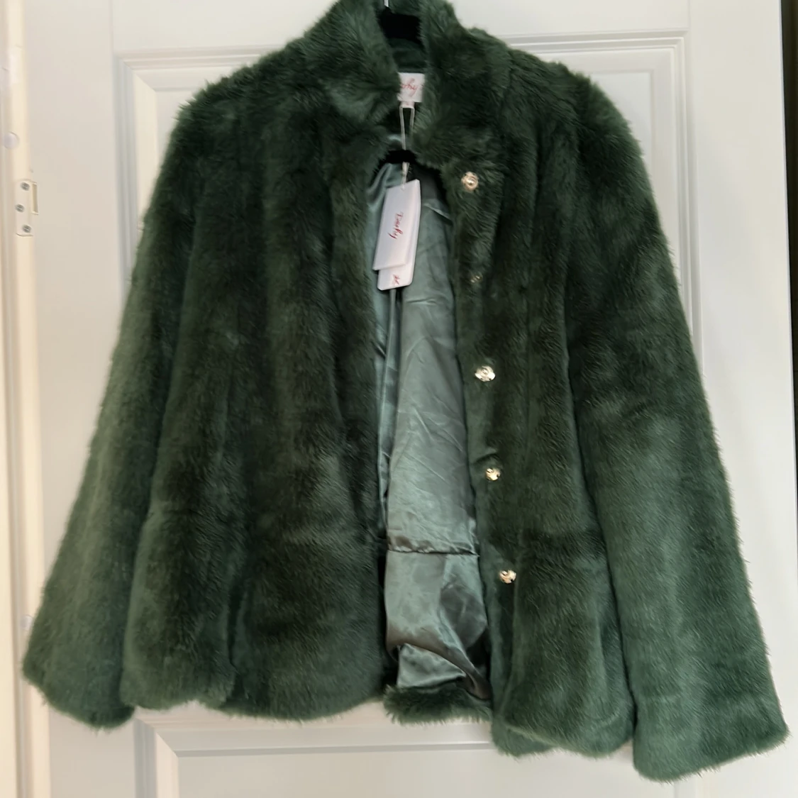 Grön fuskpälsjacka från Derby