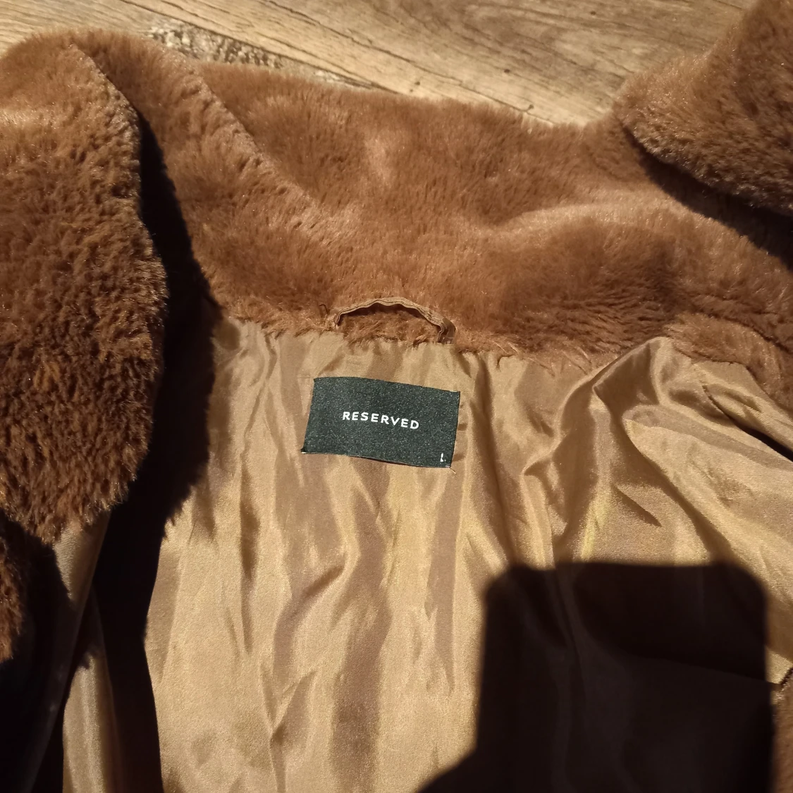 Brun pälsjacka från Reserved - 90