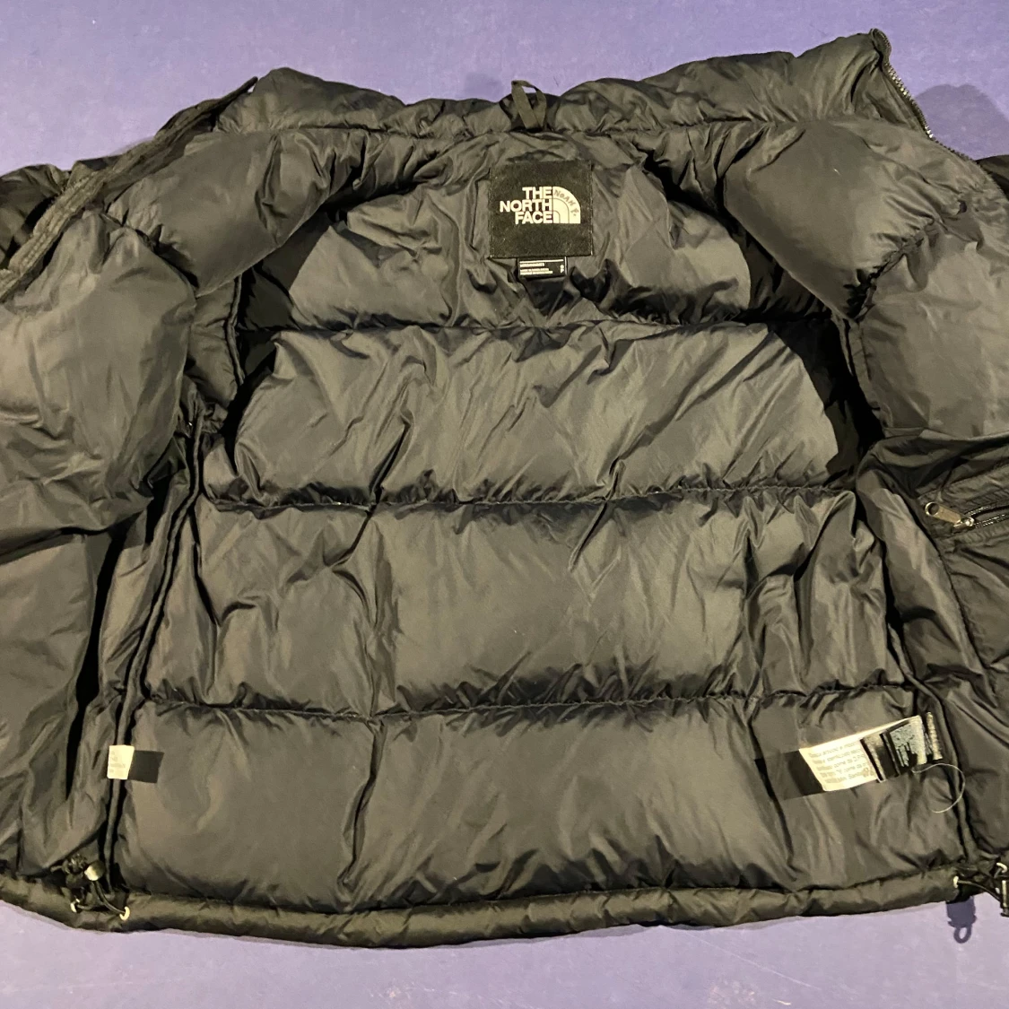 Svart dunjacka från The North Face - 90