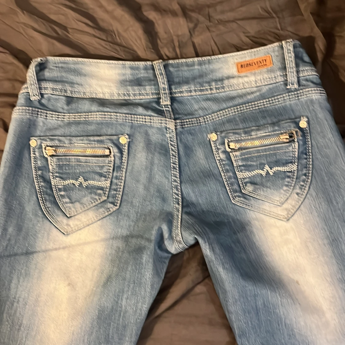 Blå lågmidjade bootcut jeans - 90