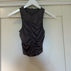 topp - Topp från märket garage 