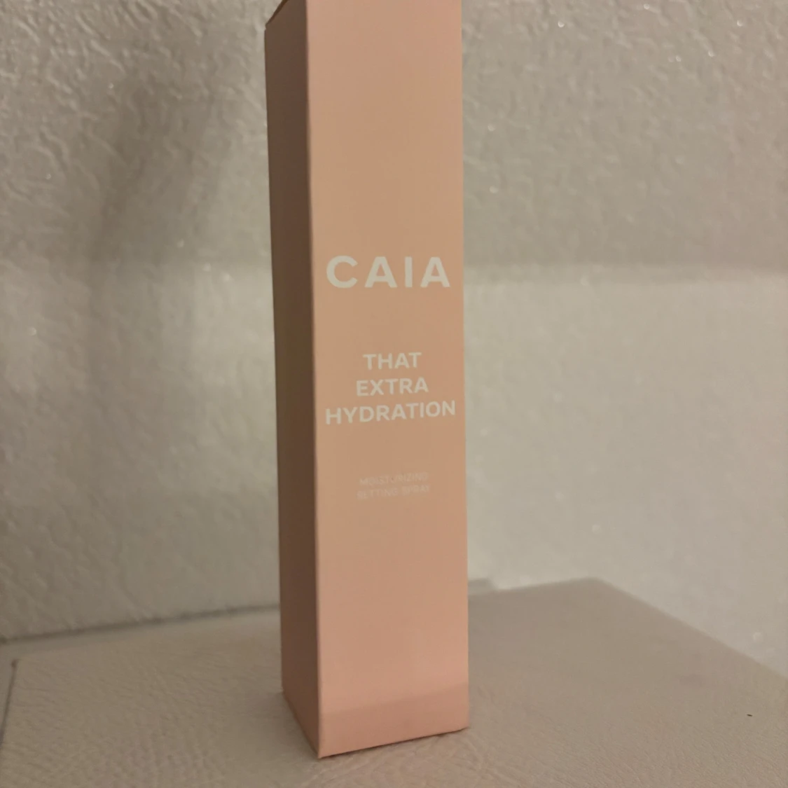 Caia setting spray