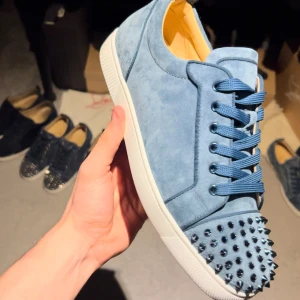 Christian Louboutin  - Sold