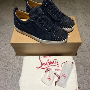 Christian Louboutin  - Sold