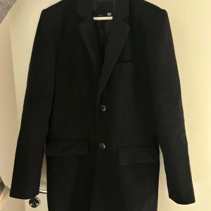 Kappa man  - Svart kappa till man, fint skick.