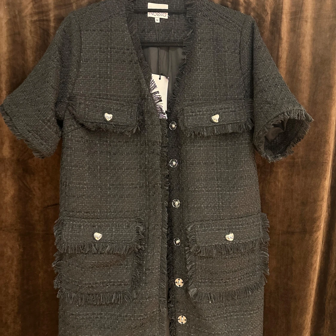 Svart kappklänning från Noella