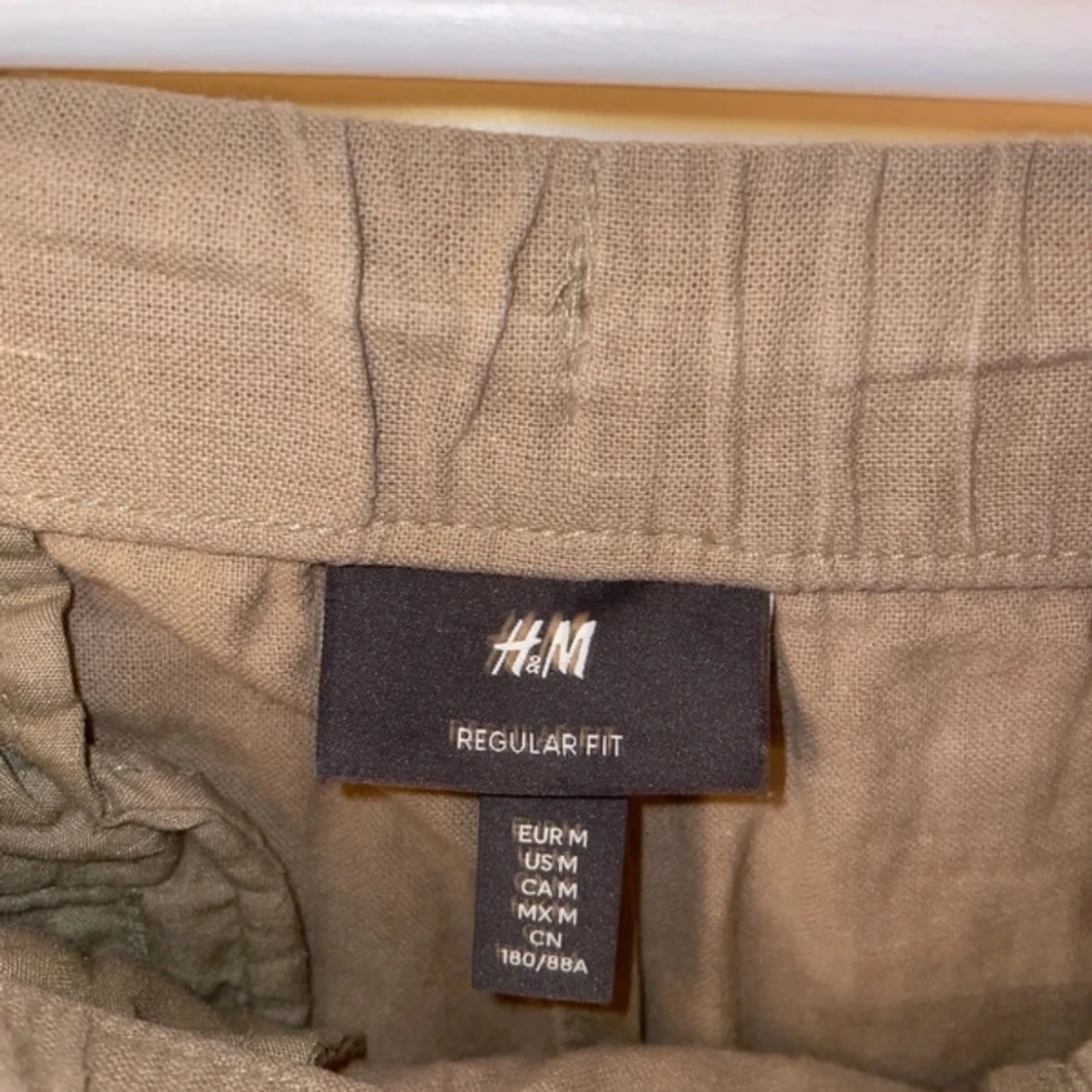 Beige byxor från H&M - 1