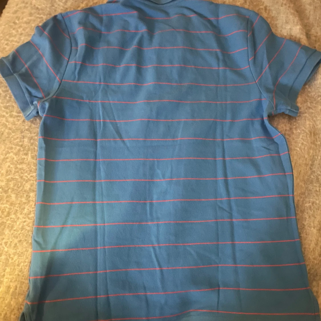 Blå randig pikétröja från Nike - 2