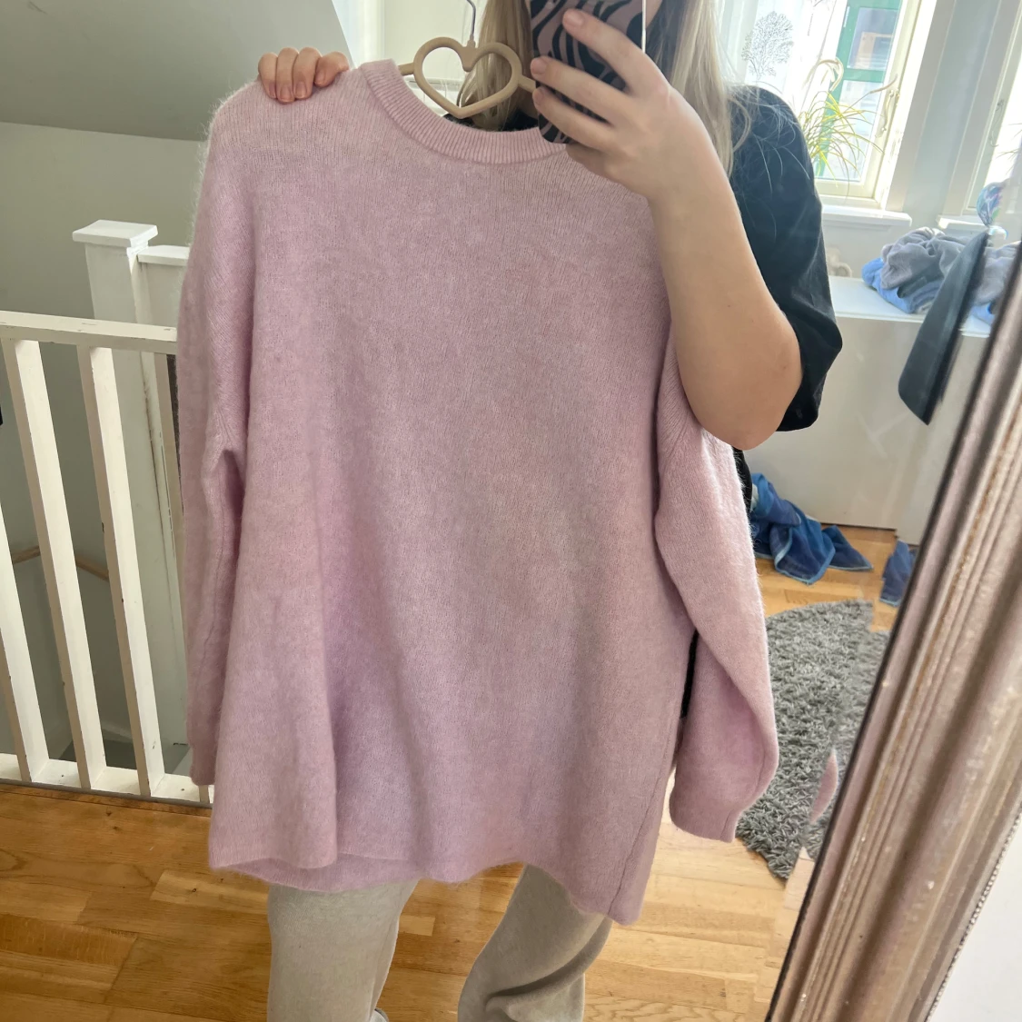 Ljusrosa stickad tröja