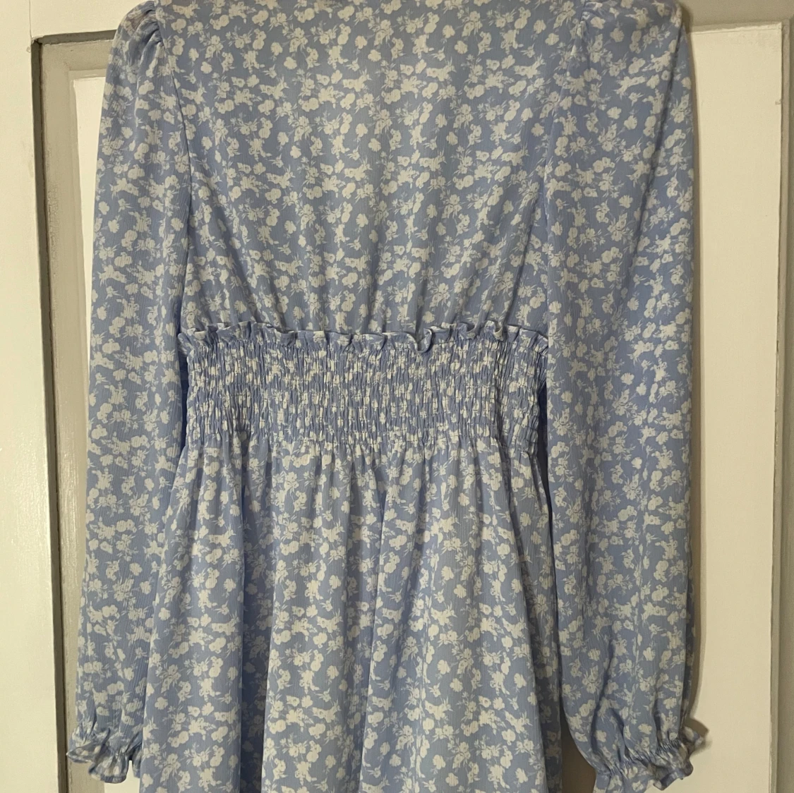 Blå blommig klänning från 157 - 90