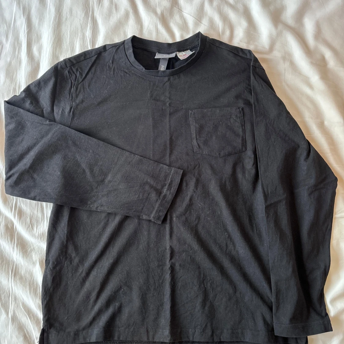 Svart långärmad t-shirt från H&M (helt oanvänd)