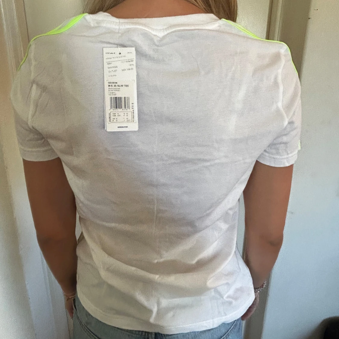 Vit t-shirt från Adidas - 90