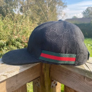 Gucci keps - Svart Gucci keps, helt ny