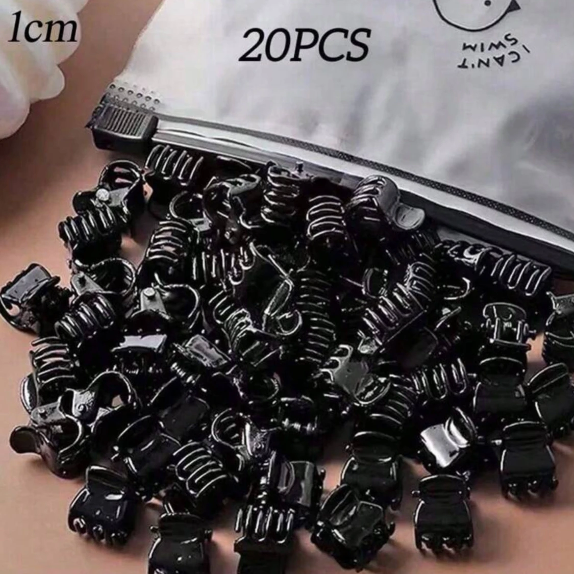 Svarta små hårklämmor  - 1