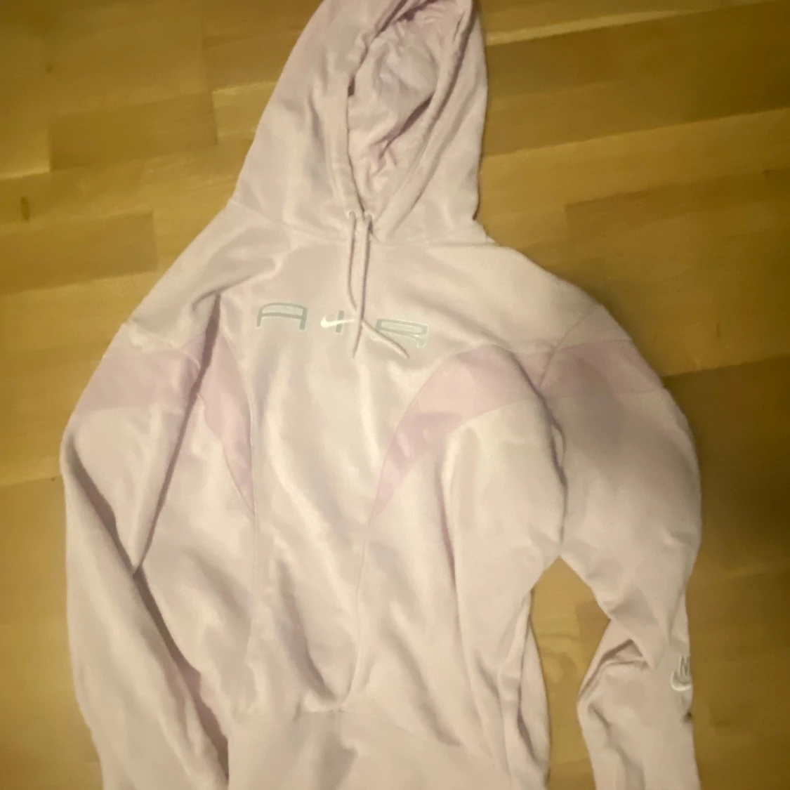 Ljusrosa hoodie från Nike