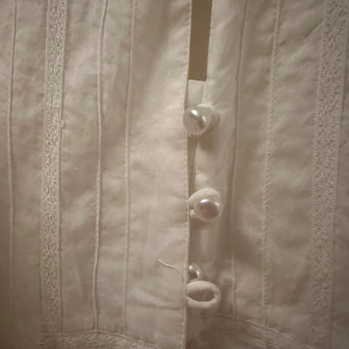 Blus med knappar - 90