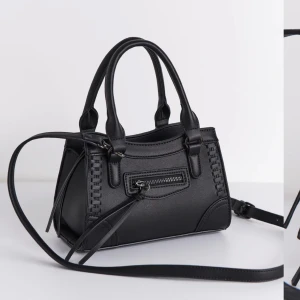 Svart handväska med axelrem - säljer denna slutsålda väskan från Gina Tricot!!