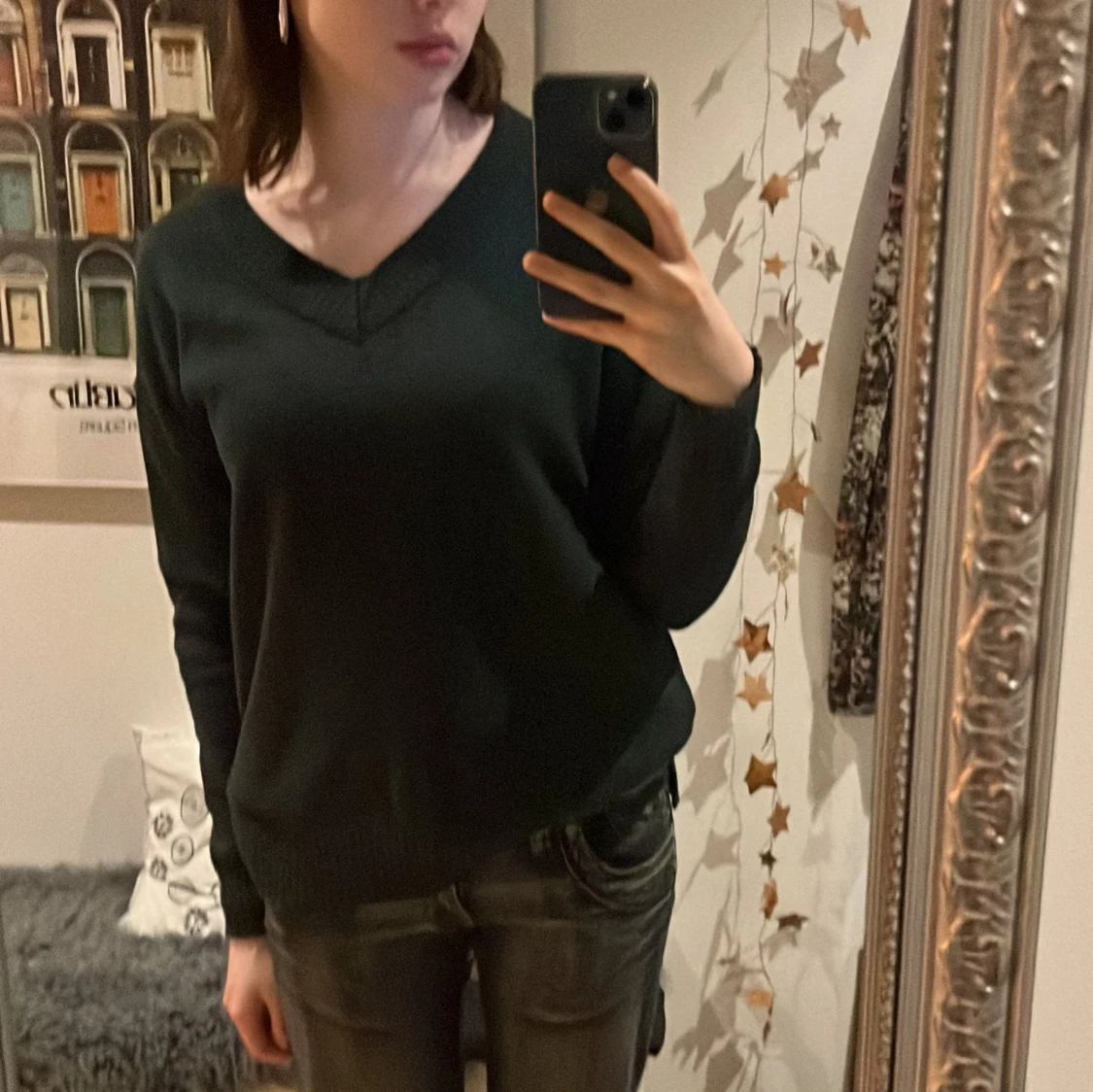 Vringad mörkgrön stickad tröja