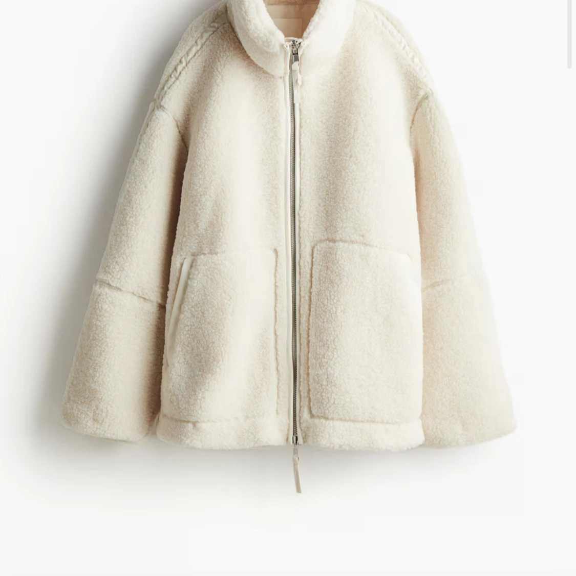 Vit teddyjacka med dragkedja