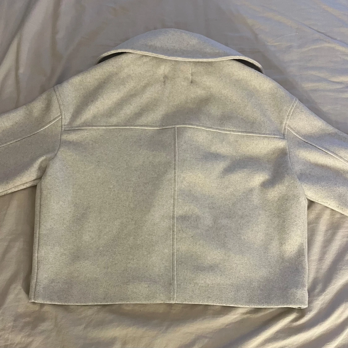 Beige kappa från strandivarius - 90