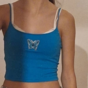Blå linnetopp - Säljer snygg blå linnetopp i storlek XS