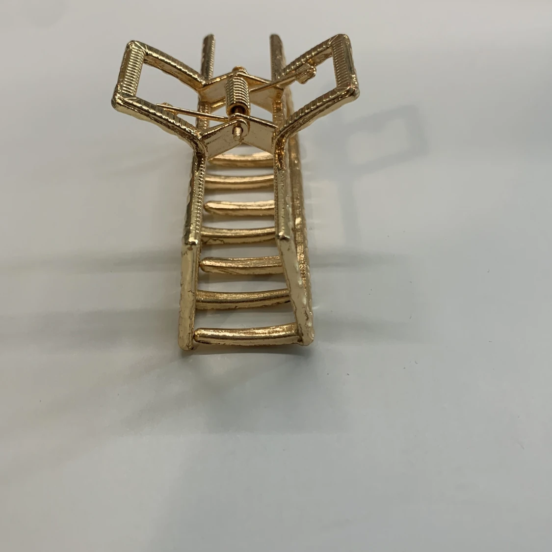 Guldfärgad hårklämma - 90