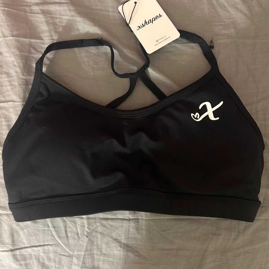 Svart sporttopp från xshapes