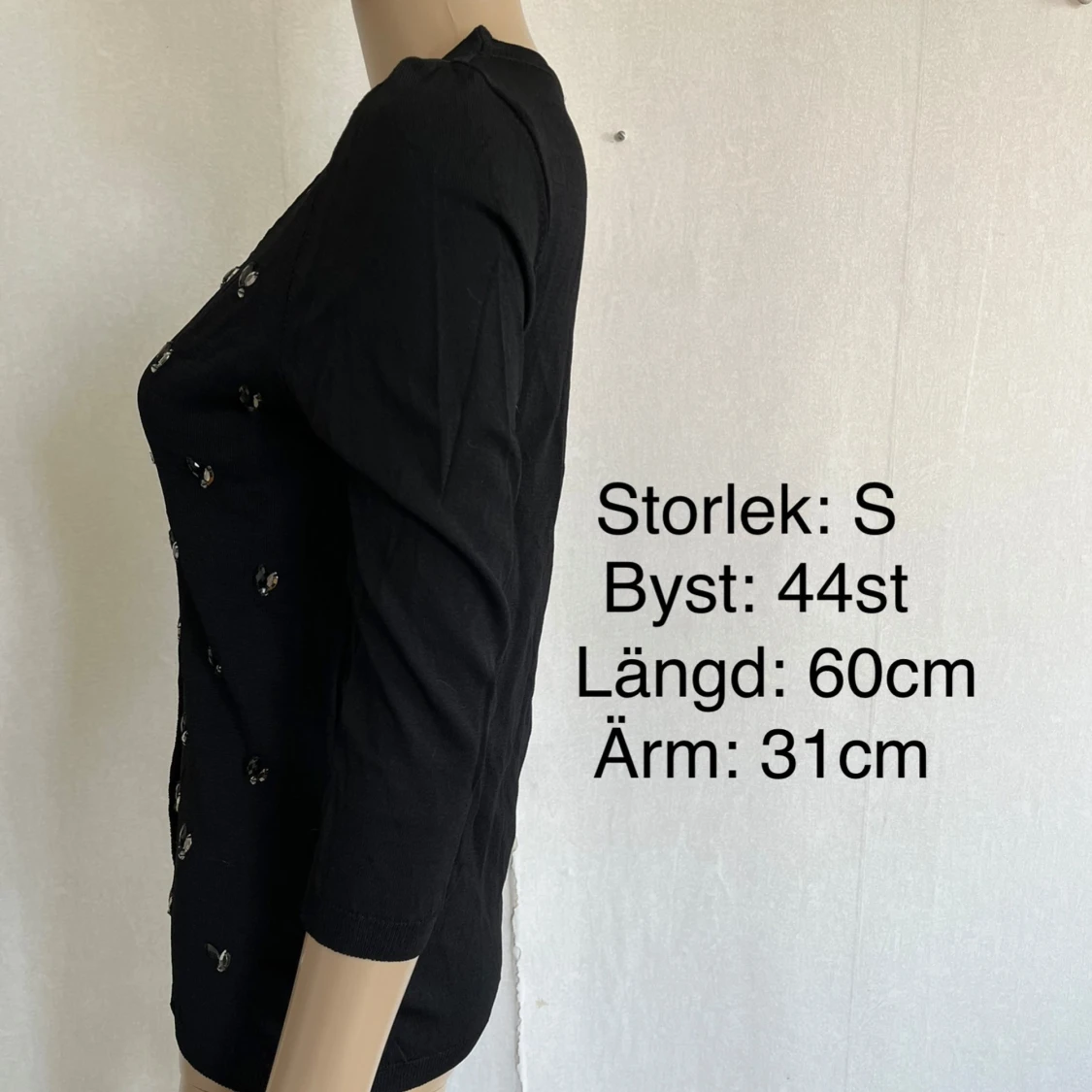 Svart kofta med paljetter - 92