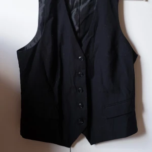 Svart kostym väst  - bra skick!!