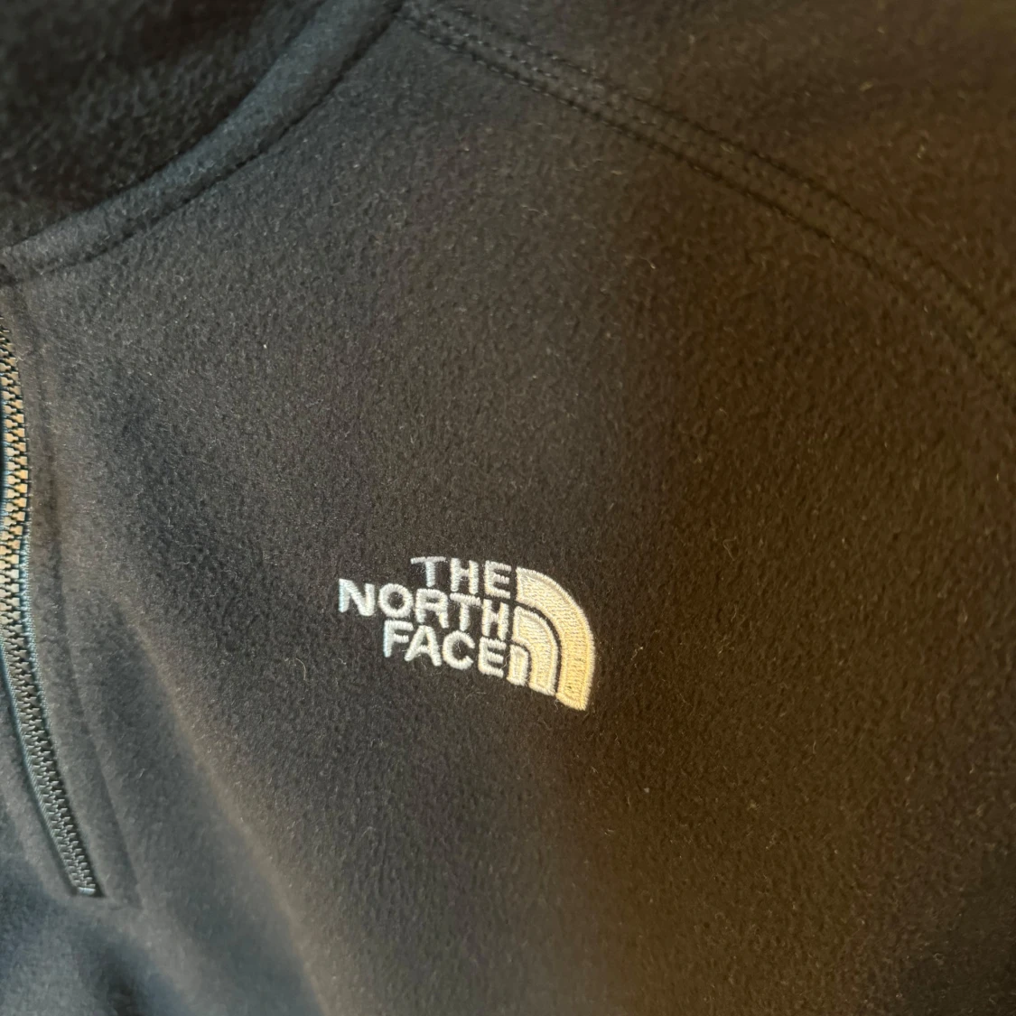 The north face svart fleece half zipup - 91