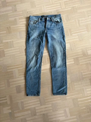 Blåa nudie jeans  - Model: solid Ollie (rak passform). Längd 32 