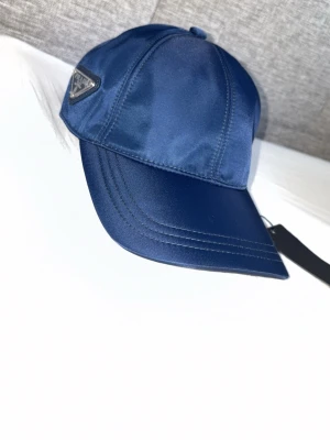 Blå keps  - Helt ny kommer med tags!