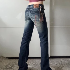 Jeans - lappar kvar, Midjemått: 37 cm , Längd: 83 cm