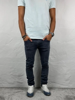 Nudie jeans  - Ett par riktigt snygga jeans från Nudie i storlek W28 L30 i modellen Tight Long John
