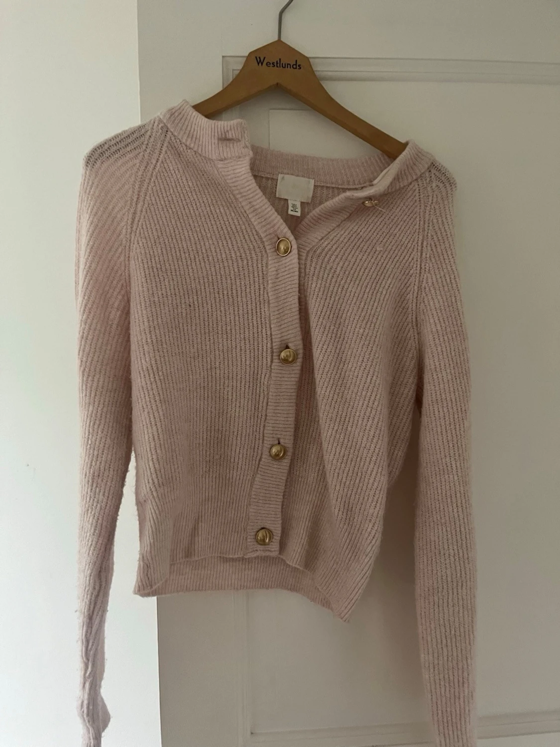 Ljusrosa kofta från H&M