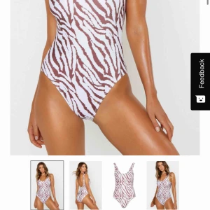  - Tigermönstrad baddräkt från boohoo, oanvänd!