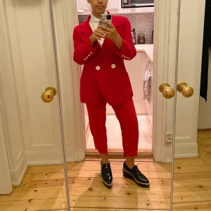 Zara bright red suit  - Another statement piece! The red on both pieces doesn’t exactly match but they still look dynamic together. The pants are a bit more worn. Prefer to sell the suit together (350) but can sell the blazer (XL) for 250 and the pants (42) for 100.