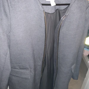Grå kappa  - Storlek 38 